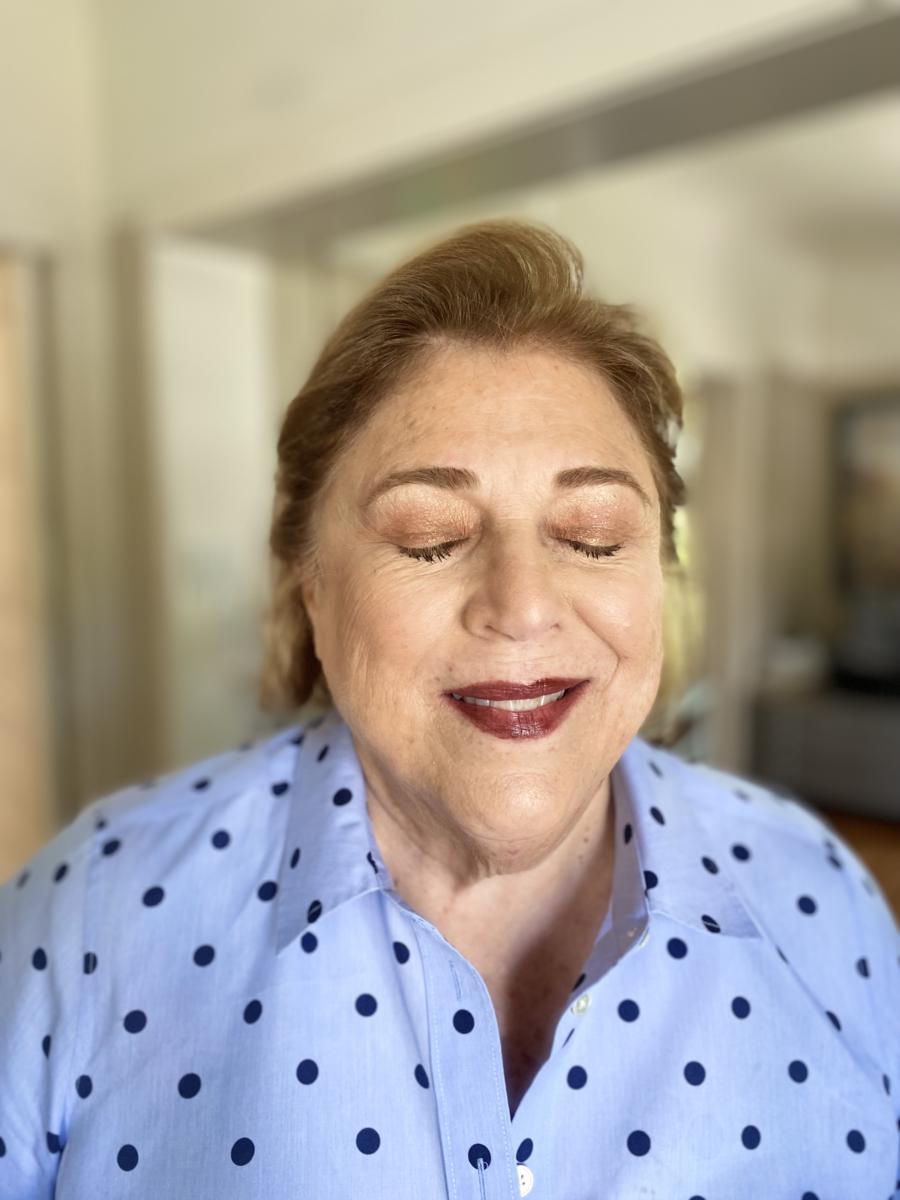 Light shimmer and a bold lip for mama!